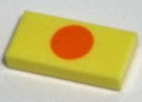 LEGO part Tile 1 x 2 with Orange Circle Pattern 3069pb1003