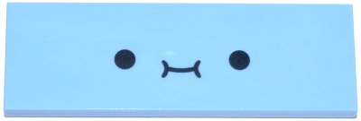 LEGO part Tile 2 x 6 with Black Smiley Face Pattern (69729pb179)
