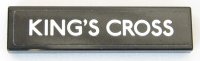 LEGO part Tile 1 x 4 with White 'KING'S CROSS' on Black Background Pattern (Sticker) - Set 75955 2431pb0588