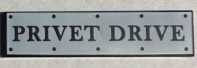 LEGO part Tile 1 x 4 with Road Sign with 'PRIVET DRIVE' and Rivets on White Background Pattern (2431pb0736)