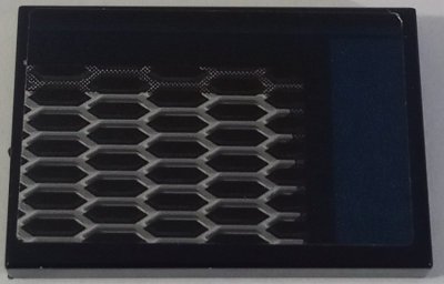 LEGO part Tile 2 x 3 with Honeycomb Grille and Dark Blue Stripe Pattern Model Left Side (Sticker) - Set 42154 (26603pb578L)