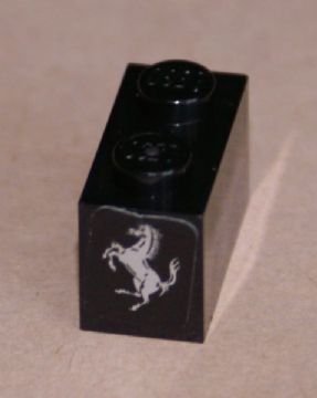 LEGO part Brick 1 x 2 with Ferrari Logo, Silver Horse Pattern on End (Sticker) - Set 8653 (3004pb120)