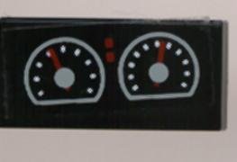 LEGO part Tile 1 x 2 with Two White Gauges Pattern (Sticker) - Set 8210 (3069pb0026)