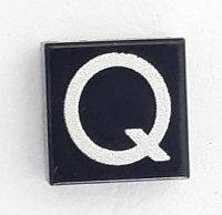 LEGO part Tile 1 x 1 with Silver Capital Letter Q Pattern - Larger Font and Parallelogram Line 3070pb025b