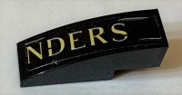 LEGO part Slope, Curved 3 x 1 with 'NDERS' Pattern (Sticker) - Set 75978 50950pb155
