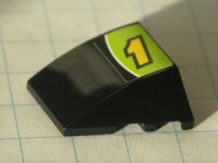 LEGO onderdeel Wedge 4 x 3 Triple Curved No Studs with Yellow Number 1 and White Line on Lime and Black Background Pattern (Sticker) - Set 8119 64225pb001