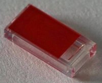 LEGO part Tile 1 x 2 with Red Rectangle Pattern 3069pb0908