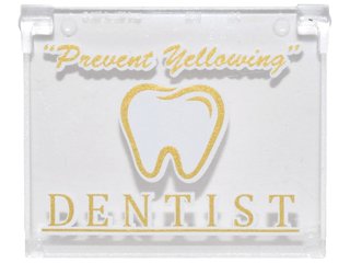 LEGO part Glass for Window 1 x 4 x 3 - Opening with Gold and White '"Prevent Yellowing"', 'DENTIST' and Tooth Pattern (60603pb007)