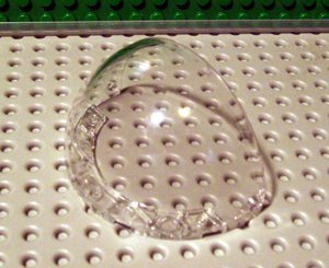 LEGO part Windscreen 8 x 4 2/3 x 3 2/3 Quarter Sphere (Outer) with Hinge Holes (88067)