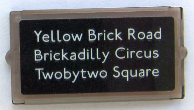 LEGO part Glass for Window 1 x 2 x 3 with 'Yellow Brick Road', 'Brickadilly Circus' and 'Twobytwo Square' Pattern (Sticker) - Set 10258 (60602pb11)