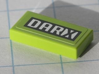 LEGO part Carreau 1 x 2 with Black and White 'DARX' Pattern (Sticker) - Set 8119 (3069pb0119)