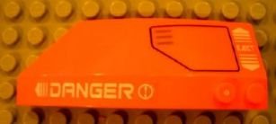 LEGO part Wedge 8 x 3 x 2 Open Right with White 'DANGER' and 'EJECT', Black Hatch Pattern (Stickers) - Set 7706 (41749pb005)