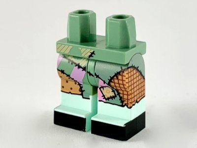 LEGO part Hips and 1 Nougat Left Leg, 1 Sand Green Right Leg with Light Aqua Boots, Multicolor Ragdoll Patchwork, Black Toes Pattern (970d45pb01)