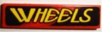 LEGO part Tile 1 x 4 with Yellow 'WHEELS' on Black and Red Pattern Model Right Side (Sticker) - Set 8219 2431pb0041R