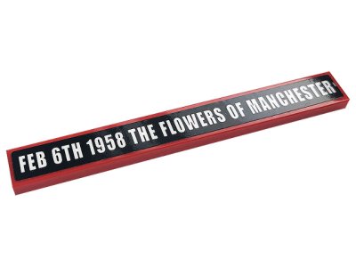 LEGO part Tile 1 x 8 with White 'FEB 6TH 1958 THE FLOWERS OF MANCHESTER' on Black Background Pattern (Sticker) - Set 10272 (4162pb238)