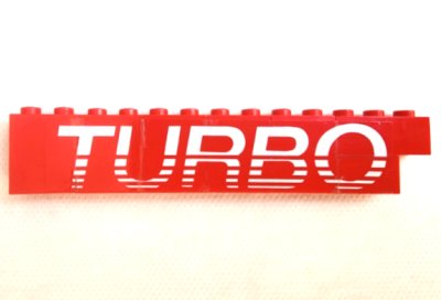 LEGO part Stickered Assembly 13 x 1 x 2 with White 'TURBO' Pattern Model Left Side (Sticker) - Set 5540 - 1 Brick 1 x 2, 1 Brick 1 x 3, 5 Panel 1 x 2 x 2 - Solid Studs (BA370pb01L)