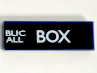 LEGO part Tile 1 x 3 with White 'BLIC', 'ALL', and 'BOX' (Police Public Call Box) on Black Background Pattern (Right Side) (63864pb038R)