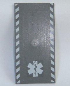 LEGO part Tile 8 x 16 with Bottom Tubes on Edges with White Safety Stripes and EMT Star of Life Pattern (Stickers) - Set 7892 (48288pb06)