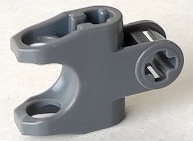 LEGO part Technic, Axle Connector 2 x 3 with Ball Joint Socket - Closed Sides, Angled Forks with Open Axle Holes (89652)