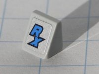 LEGO part Slope 30 1 x 1 x 2/3 with Blue 'RX' Pattern (Sticker) - Set 8120 54200pb014