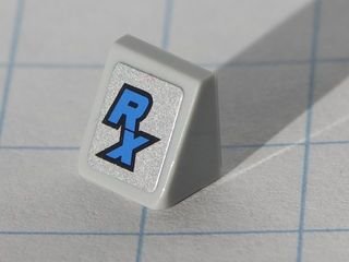LEGO part Slope 30 1 x 1 x 2/3 with Blue 'RX' Pattern (Sticker) - Set 8120 (54200pb014)