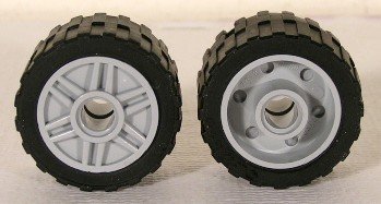 LEGO part Wheel 18mm D. x 14mm with Pin Hole, Fake Bolts and Shallow Spokes with Black Tire 24 x 14 Shallow Tread (55981 / 30648) (55981c01)