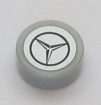 LEGO part Tile, Round 1 x 1 with Black Mercedes-Benz Logo on Silver Background Pattern (Sticker) - Set 42043 98138pb106