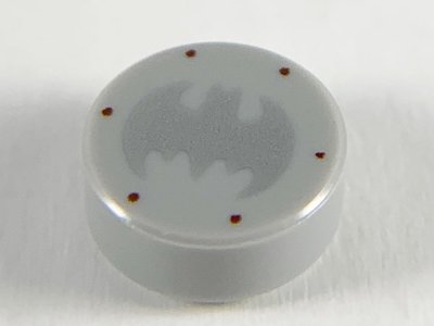 LEGO part Tile, Round 1 x 1 with Silver Bat Batman Logo and 6 Reddish Brown Rivets Pattern (98138pb111)