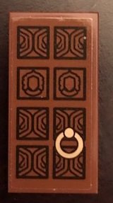 LEGO part Tile 2 x 4 with Door with Gold Pull Ring Pattern Left Side (Sticker) - Set 71043 87079pb0636L
