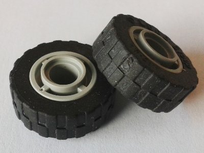 LEGO part Wheel 11mm D. x 8mm with Center Groove with Black Tire 17.5mm D. x 6mm with Shallow Staggered Treads (42610 / 42611) (42610c04)