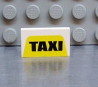 LEGO part Panel 1 x 2 x 1 with 'TAXI' on Yellow Pattern 4865px9