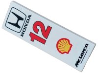 LEGO part Tile 2 x 6 with Black 'McLaren' and 'HONDA', Yellow Shell Logo and Red '12' Pattern 69729pb108