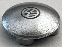 LEGO part Plate, Round 2 x 2 with Rounded Bottom with Black VW Logo on Silver Background Pattern 2654pb018