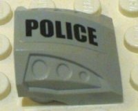 LEGO part Slope, Curved 2 x 2 with Debossed Side Ports with Black 'POLICE' Pattern Model Left Side (Sticker) - Set 7899 44675pb005L