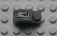 LEGO part Slope, Curved 2 x 1 x 1 1/3 with Recessed Stud with Headlight Pattern Model Right Side (Sticker) - Set 8654 6091pb006R